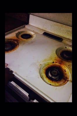 Stove top after a move out cleaning...(before)