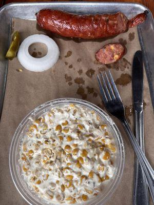 Smoked Cream Corn and 1 Link of Jalapeno Sausage