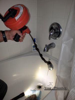 Tub drain cleaning