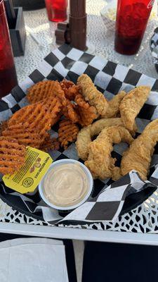 Chicken tenders and sweet potato waffle fries