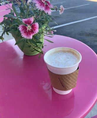 Caramel macchiato at a Simply Sweet outdoor table