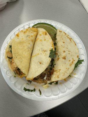 Al pastor, chicken fajita, and carnitas tacos