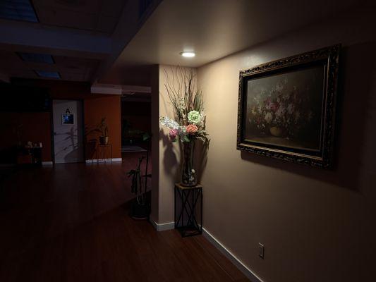 Front hallway leading to massage rooms.  Quiet with low lighting for relaxation.