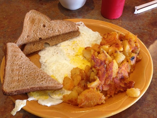 Home fries and eggs with toast. Home fries are near perfect, not too greasy!