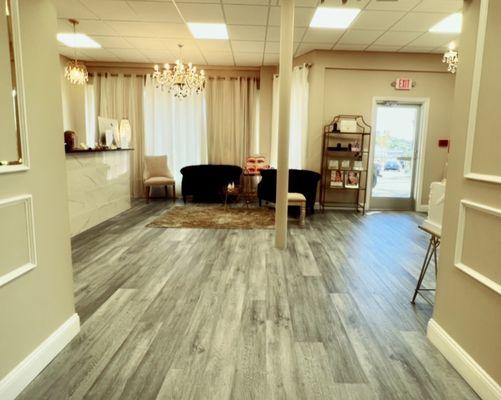 View of waiting area and front desk from treatment area.