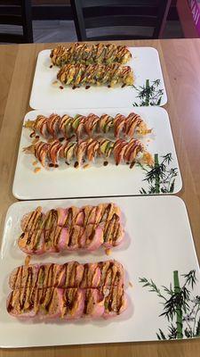 Just a couple of of our specialty sushi rolls are our very popular Mississippi roll and Madison roll, as shown in the provided photo!