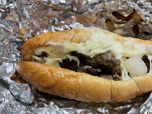 a better view of the meat in the cheesesteak