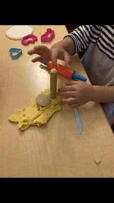 Children work with art and sensory materials