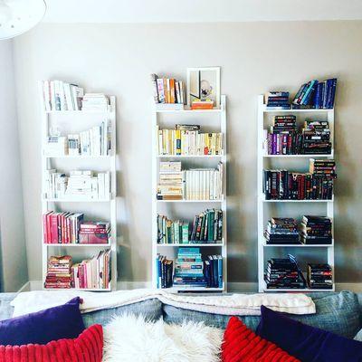 Needs a little more work but, here's some newly color coded bookcases 🌈📚