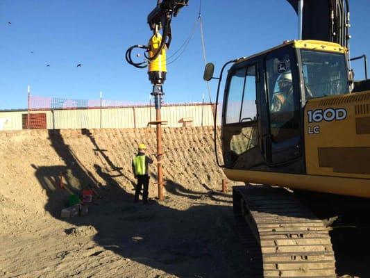 Avalon installs deep foundations with large helical piles for large commercial structures.