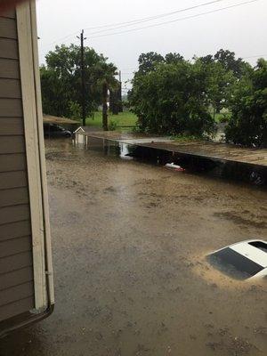 Flooding. This parking lot flooded like this once in May 2015 and again in June 2016, as pictured here.