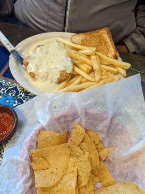 Chicken Fried Steak and gravy with fries