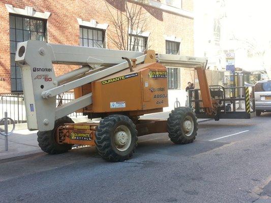 This is a 60-foot articulating boom lift we need to use when doing our pigeon repellent treatment on multi-story buildings in New York City.