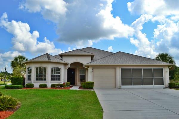 ABSOLUTELY STUNNING! 4 bed + office + bonus room/3.5 bath/3 car garage home in the Premier Gated 55+ Golf Community of Wellington. $229,900