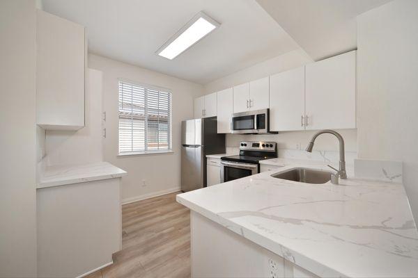 Kitchen at Missions at Rio Vista Apartments in San Diego