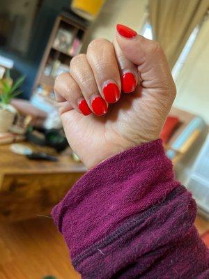 Three week old gel manicure  Still vibrantly red.