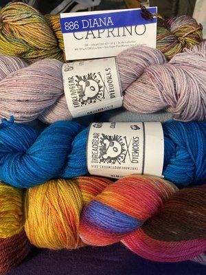 Sample of yarns we purchased. The shop brand are the two center skeins...Threadbear Dyeworks!