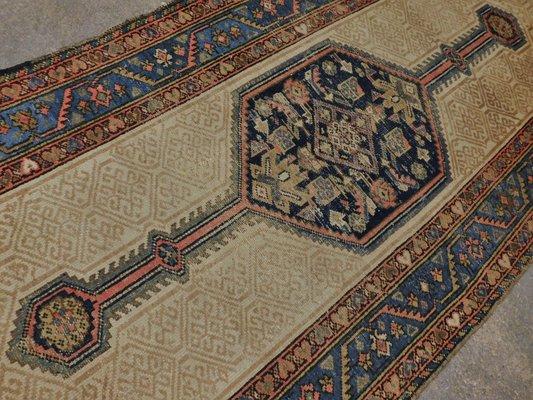 Antique Persian runner rug by Nasser Luxury Rugs.