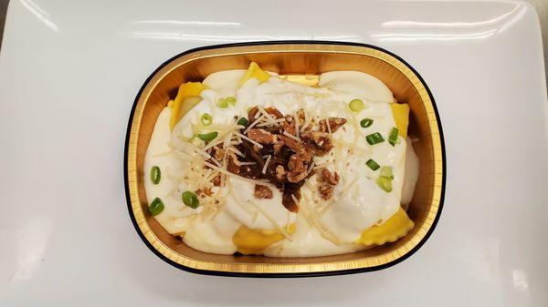 Wild Mushroom Stuffed Ravioli with Walnuts, Parmesan and Sage Cream Sauce