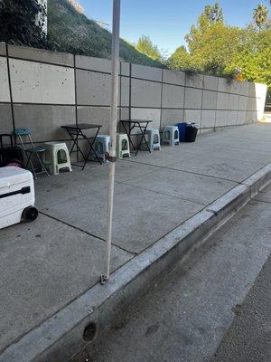 sidewalk seating under the freeway