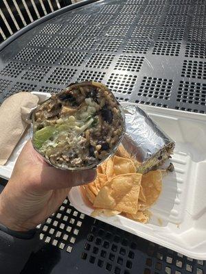 Street meat burrito with chips