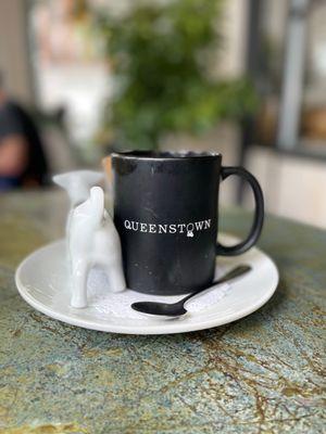 Coffee with a milky cow cup. Very cute!