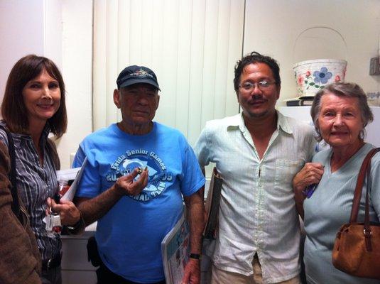 Board members at the Research Center that is in the building to the back of the property.