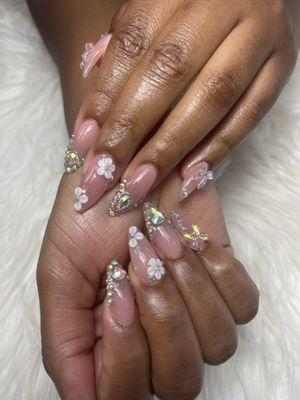 I asked for medium Stiletto nails with a customized style of gems on each finger