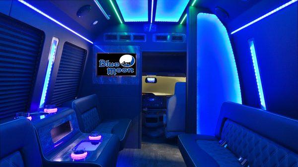 Front of the bus, its got 3 tvs, sounds system better than any club, and plush leather seats and full bar, and they put some hotties on it.