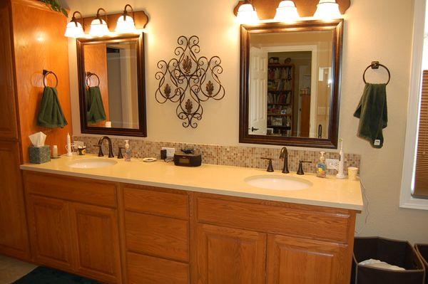 Pretty backsplash and quartz counter top. The backsplash is from Surface Art and installed by us.