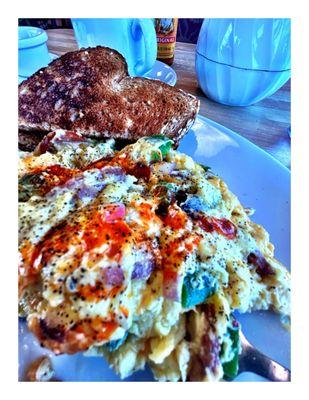 Pretty Cajun Scrambler w/Fruits & Coffee 23.04 $  @ Boulevard Bistro 2753 N Western Ave, Chicago, IL .Cool!