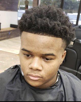 Natural sponge curl fade by Reggie