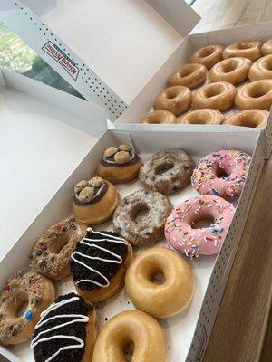 10 speciality donuts + 2 glazed & Dozen Traditional Glazed Donuts