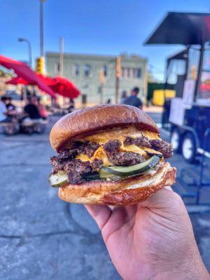 Fare Game Burger 2 Smashed Patties, American cheese, White BBQ, Griddle Onions, Mustard Pickles, Brioche bun