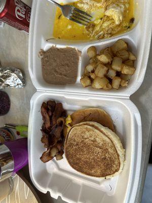 Huevos rancheros with burnt bacon, uncooked eggs and my favorite one- hamburger bun for toast bread!!!!