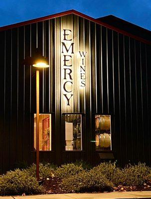 Exterior signage at dusk