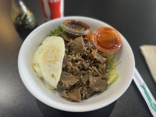 Beef Bulgogi Bowl - Mood Mover Fried egg Teriyaki sauce Hot sauce