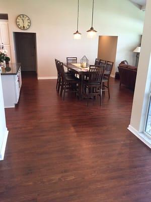 Install new laminate flooring throughout main floor