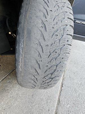 Shredded Nokian Hakkepelita Studded tires.