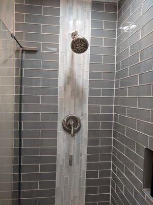 Tile shower, with waterfall accent