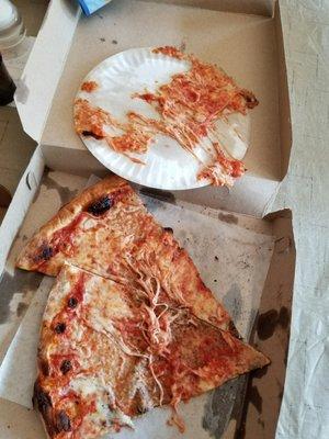 2 hot slices stacked with paper plates! Genius from people who do this everyday. I ate the top slice which was fine but the bottom slice...