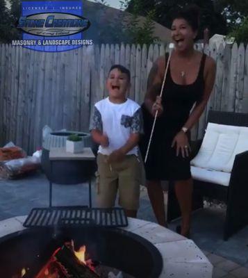 Roasting Marshmallows on your Firepit - West Babylon, NY 11704 - www.stonecreationsoflongi­sland.n