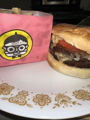 Double vegan cheese burger with vegan bacon and small fries.