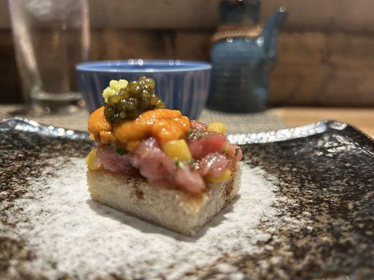 Fatty tuna with uni (sea urchin) and caviar and mango