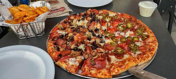 Their famous Frys and a Large Half Everest and half Pepperoni,  bacon, & Jalapeño Pizz and it is delicious every time!!!