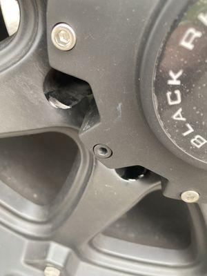 Damaged lug nut holes, improper socket used on lugs,