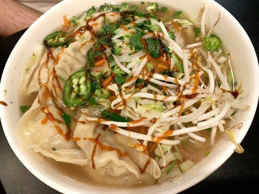 Large dumpling pho with extra noodles, toppings and sauces added on top