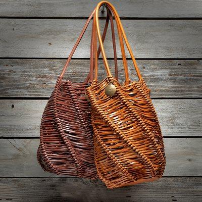 Hand-woven leather lace bucket bags.