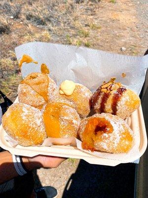 Malasadas: Plain, Haupia, Cookie Butter, Lilikoi Cream Cheese, Guava and Chocolate Peanut Butter