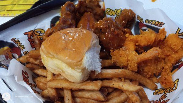 The chicken is so crispy and delicious! 5 Wings + 5 Shrimp (Sweet & Tangy) and Fries